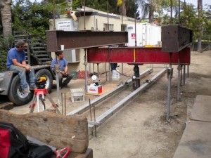 Load testing an augered pipe pile for liquefaction mitigation. Proposed project is a residential addition along the Grand Channel in Venice, California.